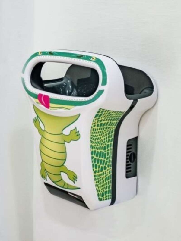 Sèche-mains Exp'air de JVD de la gamme Kids avec un autocollant crocodile